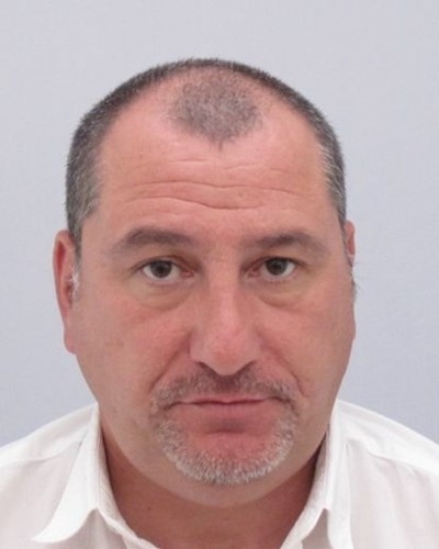 През 2008 г го арестуваха за теч на информация към хора на