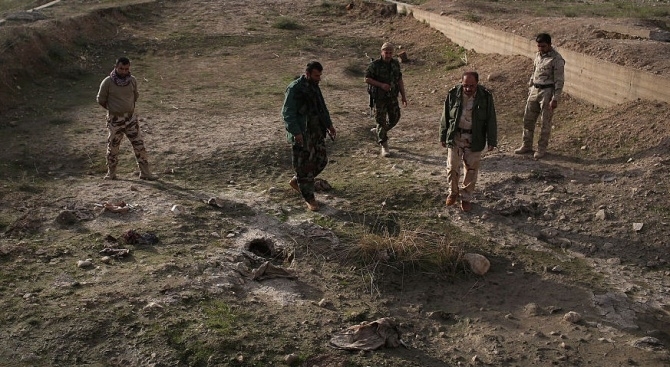 Останки на повече от 1200 души убити от членове на