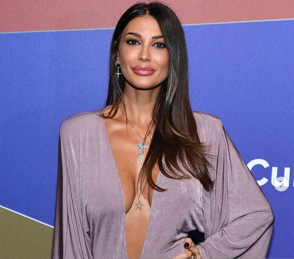 Италианският супермодел Кристина Бучино отрича връзка със звездата в мотоциклетните